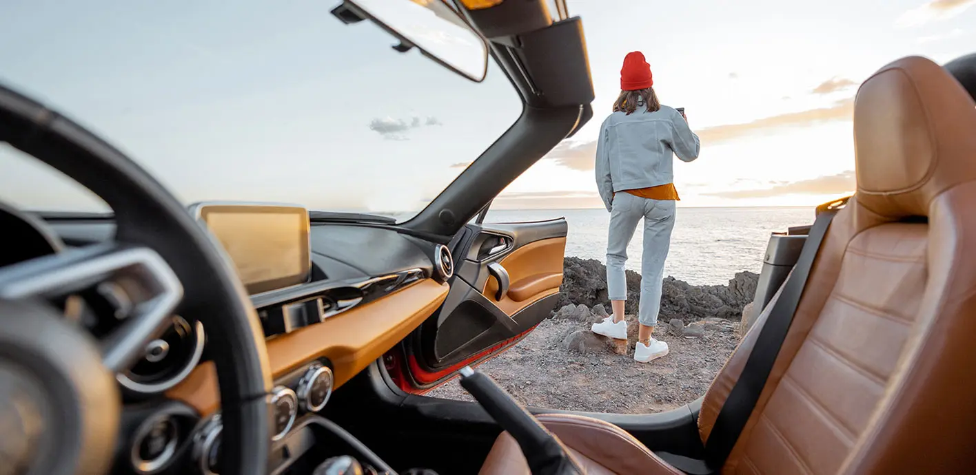 Woman traveling by car